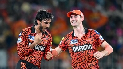 Sunrisers Hyderabad's Shahbaz Ahmed (L) celebrates with captain Pat Cummins after taking the wicket of Rajasthan Royals' Ravichandran Ashwin. (AFP) Sunrisers Hyderabad's Shahbaz Ahmed (L) celebrates with captain Pat Cummins after taking the wicket of Rajasthan Royals' Ravichandran Ashwin. (AFP)