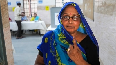 Voting began at 7 am&nbsp;and&nbsp;people&nbsp;were seen&nbsp;queuing up at polling stations. (PTI)