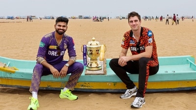 Kolkata Knight Riders captain Shreyas Iyer and Sunrisers Hyderabad's Pat Cummins pose for photos with the Indian Premier League (IPL) trophy (PTI)