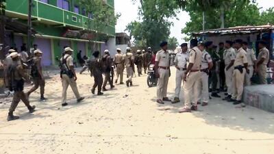 Police in the area after the post-poll clash in Chapra on May 21, in which an RJD worker was shot dead and two others were injured. (ANI) Police in the area after the post-poll clash in Chapra on May 21, in which an RJD worker was shot dead and two others were injured. (ANI)