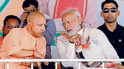 Prime Minister Narendra Modi with chief minister Yogi Adityanath in Ghazipur on Saturday. (HT Photo)