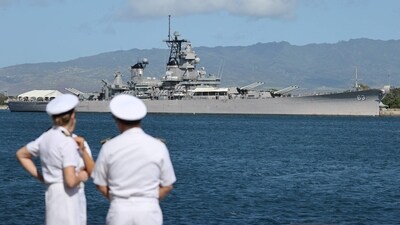 With the USS Missouri batteship memorial in the background, US Navy personnel await the start of the US Indo-Pacific Command (INDOPACOM) change of command ceremony on Kilo Pier at Joint Base Pearl Harbor-Hickam in Honolulu, Hawaii, on May 3, 2024. Incoming commander Admiral Samuel Paparo is replacing outgoing commander Admiral John Aquilino. (Photo by Marco GARCIA / AFP) (AFP) With the USS Missouri batteship memorial in the background, US Navy personnel await the start of the US Indo-Pacific Command (INDOPACOM) change of command ceremony on Kilo Pier at Joint Base Pearl Harbor-Hickam in Honolulu, Hawaii, on May 3, 2024. Incoming commander Admiral Samuel Paparo is replacing outgoing commander Admiral John Aquilino. (Photo by Marco GARCIA / AFP) (AFP)