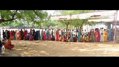 Voters standing in queues at polling booths in Prayagraj during phase six polling on May 25 (Anil K Maurya/HT)