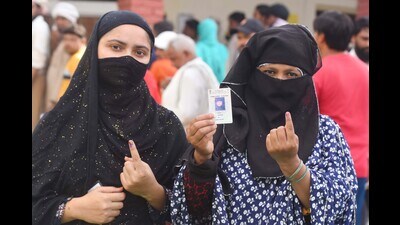 Women showing their inked finger after casting their vote during the sixth phase of the Lok Sabha elections in a village at Mewat, Nuh on Saturday. (Parveen Kumar/HT PHOTO) Women showing their inked finger after casting their vote during the sixth phase of the Lok Sabha elections in a village at Mewat, Nuh on Saturday. (Parveen Kumar/HT PHOTO)