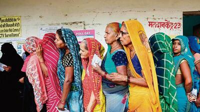 Women stand in a queue to cast their votes at a polling station in Saroi village, Bhadohi on Saturday (AFP PHOTO) Women stand in a queue to cast their votes at a polling station in Saroi village, Bhadohi on Saturday (AFP PHOTO)