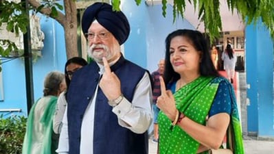 Union Minister Hardeep Singh Puri and his wife Lakshmi Puri cast their votes at a polling booth in Delhi on Saturday. Union Minister Hardeep Singh Puri and his wife Lakshmi Puri cast their votes at a polling booth in Delhi on Saturday.