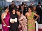 Payal Kapadia, second from left , winner of the grand prize for 'All We Imagine as Light,' poses with Divya Prabha, from left, Chhaya Kadam and Kani Kusruti during the photo call following the awards ceremony at the 77th international film festival, Cannes, southern France, Saturday, May 25, 2024. (Photo by Scott A Garfitt/Invision/AP/PTI)(AP05_26_2024_000234A) Payal Kapadia, second from left , winner of the grand prize for 'All We Imagine as Light,' poses with Divya Prabha, from left, Chhaya Kadam and Kani Kusruti during the photo call following the awards ceremony at the 77th international film festival, Cannes, southern France, Saturday, May 25, 2024. (Photo by Scott A Garfitt/Invision/AP/PTI)(AP05_26_2024_000234A)