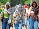 Students are walking into exam halls armed with protective gear and bottles of water-based drinks to battle the high temperature in Delhi. Students are walking into exam halls armed with protective gear and bottles of water-based drinks to battle the high temperature in Delhi.