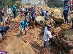 Villagers search through a landslide in Pogera village, in the Highlands of Papua New Guinea, Sunday, May 26, 2024. Villagers search through a landslide in Pogera village, in the Highlands of Papua New Guinea, Sunday, May 26, 2024.