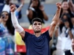 Spain's Carlos Alcaraz celebrates after winning his first round match against JJ Wolf of the United States 