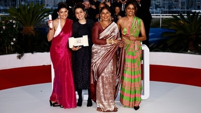 Cannes Film Festival 2024: The director and the cast of All We Imagine as Light, who won the Grand Prix award, pose during a photocall after the closing ceremony of the 77th Cannes Film Festival. In the picture, one can see director Payal Kapadia with cast members Divya Prabha, Kani Kusruti and Chhaya Kadam. The three actors looked stunning as they respresented India in gorgeous silk sarees.&nbsp; (REUTERS)