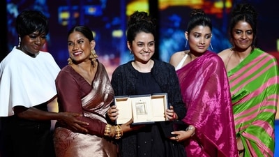 Payal Kapadia with her cast Chhaya Kadam, Divya Prabha and Kani Kusruti after she was awarded with the Grand Prix for the film All We Imagine as Light by Viola Davis during the Closing Ceremony at the 77th edition of the Cannes Film Festival. (AFP) Payal Kapadia with her cast Chhaya Kadam, Divya Prabha and Kani Kusruti after she was awarded with the Grand Prix for the film All We Imagine as Light by Viola Davis during the Closing Ceremony at the 77th edition of the Cannes Film Festival. (AFP)