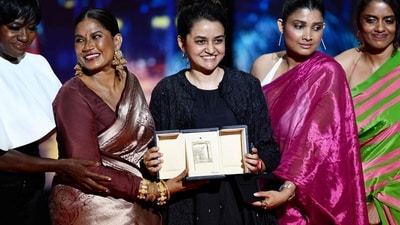 Payal Kapadia with her cast Chhaya Kadam, Divya Prabha and Kani Kusruti after she was awarded with the Grand Prix for the film All We Imagine as Light by Viola Davis during the Closing Ceremony at the 77th edition of the Cannes Film Festival. (AFP) Payal Kapadia with her cast Chhaya Kadam, Divya Prabha and Kani Kusruti after she was awarded with the Grand Prix for the film All We Imagine as Light by Viola Davis during the Closing Ceremony at the 77th edition of the Cannes Film Festival. (AFP)