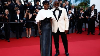 Cannes Film Festival 2024: Viola Davis and her husband US actor Julius Tennon attended the Closing Ceremony of the 77th Cannes Film Festival. Viola looked glamorous in a black sequinned gown featuring a short white cape attachment on the bodice. (AFP) Cannes Film Festival 2024: Viola Davis and her husband US actor Julius Tennon attended the Closing Ceremony of the 77th Cannes Film Festival. Viola looked glamorous in a black sequinned gown featuring a short white cape attachment on the bodice. (AFP)