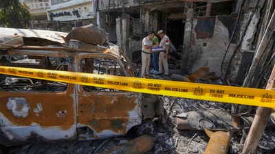 Policemen outside a children's hospital where a fire broke out on Saturday night at Vivek Vihar area in Delhi. (PTI) Policemen outside a children's hospital where a fire broke out on Saturday night at Vivek Vihar area in Delhi. (PTI)