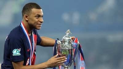 PSG Kylian Mbappe celebrates with the trophy after winning the Coupe de France REUTERS/Catherine Steenkeste (REUTERS)
