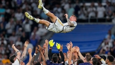 Real Madrid's Toni Kroos is lifted in the air by his teammates. (AP) Real Madrid's Toni Kroos is lifted in the air by his teammates. (AP)