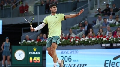 Spain's Carlos Alcaraz returns the ball to Russia's Andrey Rublev during the 2024 ATP Tour Madrid Open tournament quarter-final tennis match at Caja Magica in Madrid (AFP) Spain's Carlos Alcaraz returns the ball to Russia's Andrey Rublev during the 2024 ATP Tour Madrid Open tournament quarter-final tennis match at Caja Magica in Madrid (AFP)