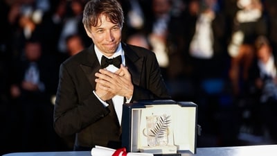 Sean Baker poses with the trophy during a photocall after he won the Palme d'Or for Anora during the Closing Ceremony at the 77th edition of the Cannes Film Festival in Cannes, southern France, on May 25, 2024. (AFP) Sean Baker poses with the trophy during a photocall after he won the Palme d'Or for Anora during the Closing Ceremony at the 77th edition of the Cannes Film Festival in Cannes, southern France, on May 25, 2024. (AFP)