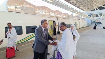 The first group of pilgrims to travel in the train were escorted by Indian ambassador Suhel Ajaz Khan and consul general Mohammed Shahid Alam. (Indian embassy)