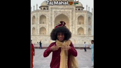 Snapshot of the influencer dancing outside the monument. Snapshot of the influencer dancing outside the monument.