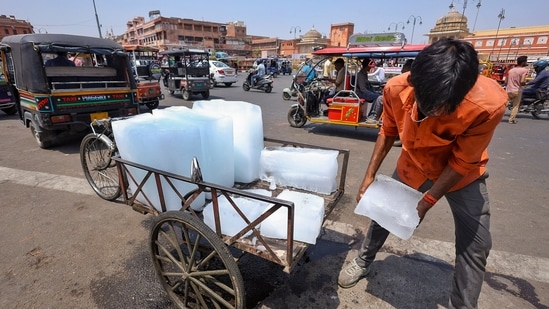 India heatwave news live: A vendor sells ice on a hot summer day in Jaipur. India heatwave news live: A vendor sells ice on a hot summer day in Jaipur.