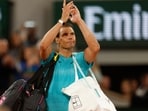 Spain's Rafael Nadal waves as he leaves the court. Spain's Rafael Nadal waves as he leaves the court.