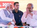 Prime Minister Narendra Modi with Odisha CM Naveen Patnaik in Chandikhole, Odisha recently. (ANI Photo)