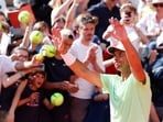 Spain's Rafael Nadal acknowledges fans during a practice session 