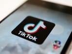 The TikTok logo is displayed on a smartphone screen in Tokyo, Japan. The TikTok logo is displayed on a smartphone screen in Tokyo, Japan.