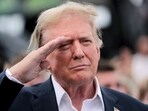 Former President Donald Trump salutes during opening ceremonies as he attends the NASCAR Coca-Cola 600 auto race, Sunday, May 26, 2024, in Concord, N.C. It is the first time that a president or former president has attended a race at Charlotte Motor Speedway. (AP Photo/Chris Seward) Former President Donald Trump salutes during opening ceremonies as he attends the NASCAR Coca-Cola 600 auto race, Sunday, May 26, 2024, in Concord, N.C. It is the first time that a president or former president has attended a race at Charlotte Motor Speedway. (AP Photo/Chris Seward)