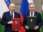 Russian President Vladimir Putin and Uzbek President Shavkat Mirziyoyev 