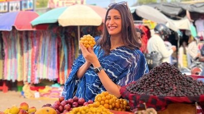 Aahana S Kumra checking out fruits at a stall in Aminabad Aahana S Kumra checking out fruits at a stall in Aminabad