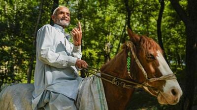 An elderly man shows his inked finger after casting his vote at a polling booth during the sixth phase of Lok Sabha elections at Nandimarg area in Kulgam district of South Kashmir on Saturday. (PTI) An elderly man shows his inked finger after casting his vote at a polling booth during the sixth phase of Lok Sabha elections at Nandimarg area in Kulgam district of South Kashmir on Saturday. (PTI)