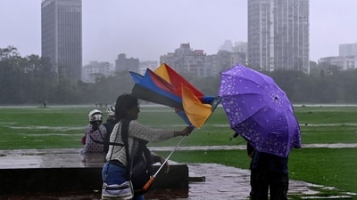 Young people enjoy an overcast rainy day. (Hindustan Times) Young people enjoy an overcast rainy day. (Hindustan Times)
