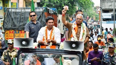 Bharatiya Janata Party (BJP) candidate from Bardhaman Durgapur seat Dilip Ghosh holds his party symbol 'Lotus' during an election campaign. (ANI file) Bharatiya Janata Party (BJP) candidate from Bardhaman Durgapur seat Dilip Ghosh holds his party symbol 'Lotus' during an election campaign. (ANI file)