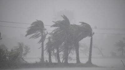 Heavy winds and rains caused by Cyclone Remal along the coastal areas in West Bengal’s South 24 Parganas on Monday. (AP) Heavy winds and rains caused by Cyclone Remal along the coastal areas in West Bengal’s South 24 Parganas on Monday. (AP)