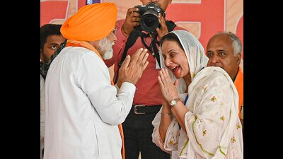 Prime Minister Narendra Modi being greeted by BJP candidate Preneet Kaur in Patiala. (PTI file) Prime Minister Narendra Modi being greeted by BJP candidate Preneet Kaur in Patiala. (PTI file)