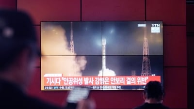 A TV screen shows a file image of North Korea's rocket launch during a news program at a bus terminal in Seoul, South Korea. (AP) A TV screen shows a file image of North Korea's rocket launch during a news program at a bus terminal in Seoul, South Korea. (AP)