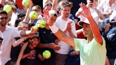 Spain's Rafael Nadal acknowledges fans during a practice session (REUTERS)