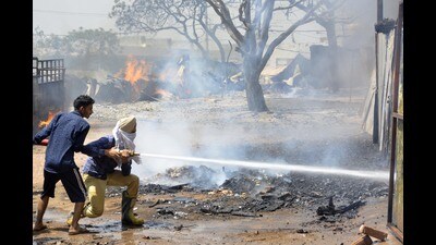 The fire initially broke out in one of these closely placed teen shed structures, soon spreading to the nearby furniture workshops and godowns burning the furniture items and other goods. (Sant Arora/HT)