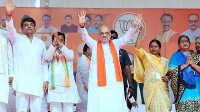 Union Home Minister Amit Shah greets people during a public meeting for the Lok Sabha polls, in Kushinagar on Monday. (ANI) Union Home Minister Amit Shah greets people during a public meeting for the Lok Sabha polls, in Kushinagar on Monday. (ANI)