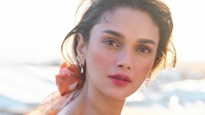 Aditi Rao Hydari had worn a black-and-white off-shoulder dress for her red carpet outing at Cannes. Aditi Rao Hydari had worn a black-and-white off-shoulder dress for her red carpet outing at Cannes.