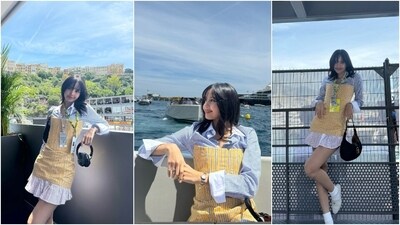 Lisa's second look during the race weekend showed the K-pop singer dressed in another mini number featuring pinstripe patterns in yellow, black, blue and white hues. She wore the ensemble over a button-down shirt.&nbsp; (Instagram)