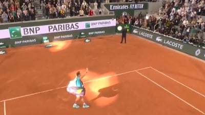 Rafael Nadal waves to the crowd.