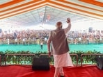 Prime Minister Narendra Modi waves to the crowd during the public meeting ahead of the seventh phase of Lok Sabha Polls. Prime Minister Narendra Modi waves to the crowd during the public meeting ahead of the seventh phase of Lok Sabha Polls.