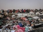 Palestinians inspect damage at the site of an Israeli strike on an area designated for displaced people in Rafah, southern Gaza Strip, on Monday, May 27, 2024. At least 40 Palestinians were killed in an Israeli airstrike at a camp for displaced people in the southern city of Rafah late Sunday, the Hamas-run ministry of health said.�Photographer: Ahmad Salem/Bloomberg(Bloomberg)