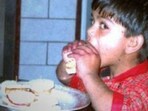 Virat Kohli had shared this photo of his younger self enjoying burger. Virat Kohli had shared this photo of his younger self enjoying burger.