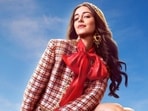 Ananya Panday, dressed in a chic tweed jacket and mini skirt, in the poster of Call Me Bae. 