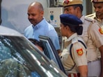 Delhi Police personnel with Chief Minister Arvind Kejriwal's aide Bibhav Kumar.